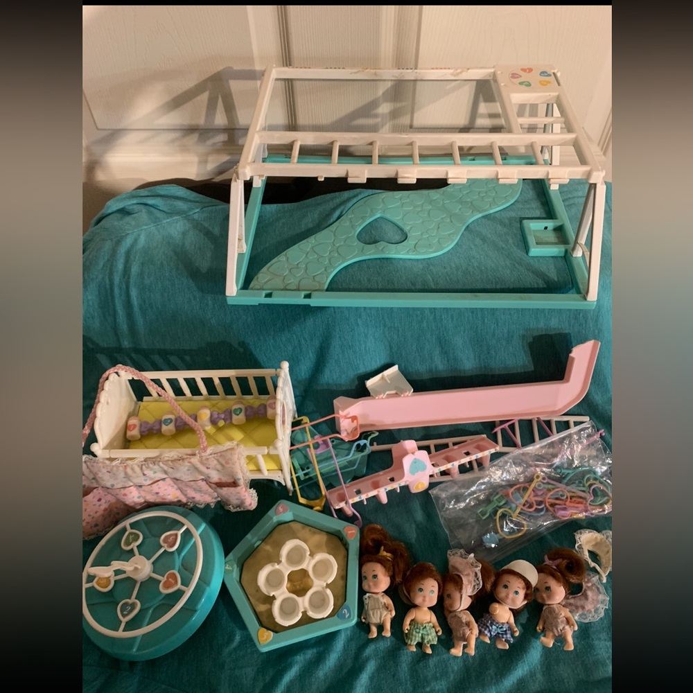 Vintage Tyco Quints 
Baby dolls includes crib, bottles, and playground set